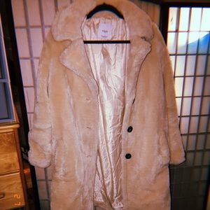 Fur jacket from Mango. Used.